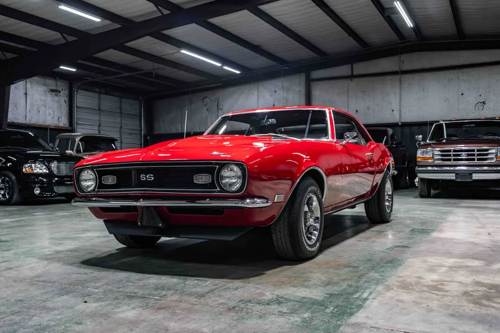 Classic and muscle cars lined up at the Southwood Auto showroom